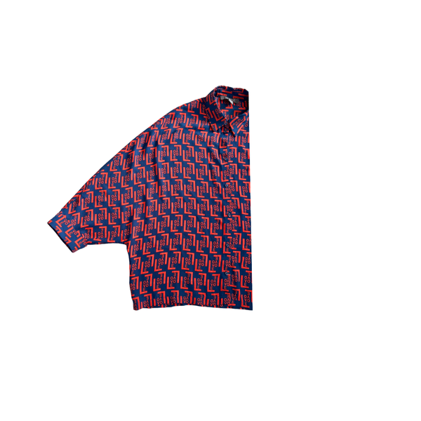 Short-sleeve shirt with geometric pattern on a white background