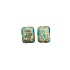 Pair of floral patterned earrings on a white background