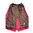 Plaid patterned garment with pink lining on a white background