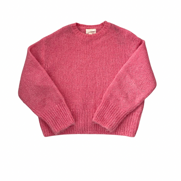 Pink sweater on a white background