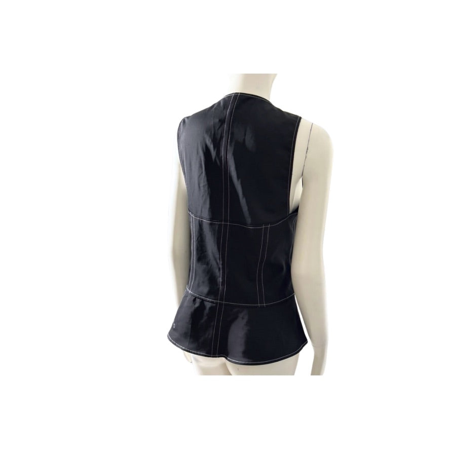 Black leather vest on a mannequin against a white background