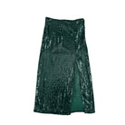 Green sequin skirt on a white background