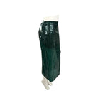 Green plastic cover on a mannequin against a white background