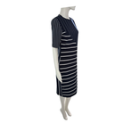 Mannequin wearing a navy and white striped dress on a white background