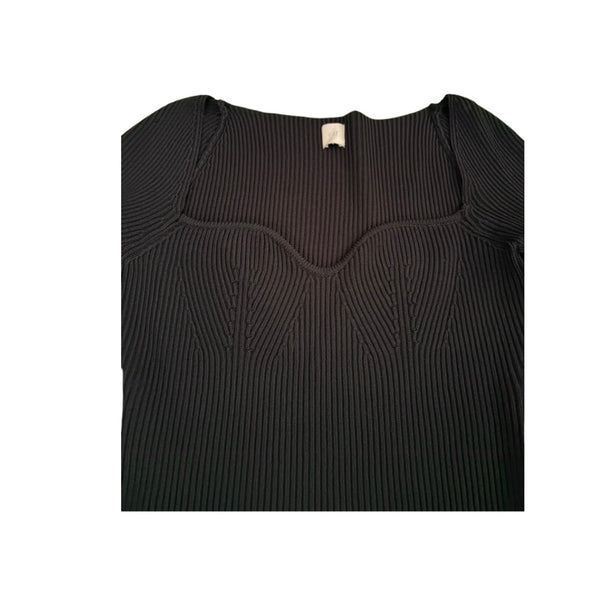 Black ribbed sweater on a white background