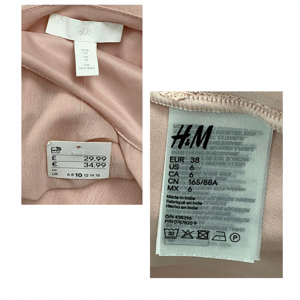 Close-up of H&M clothing tag on a garment with visible size and price information.