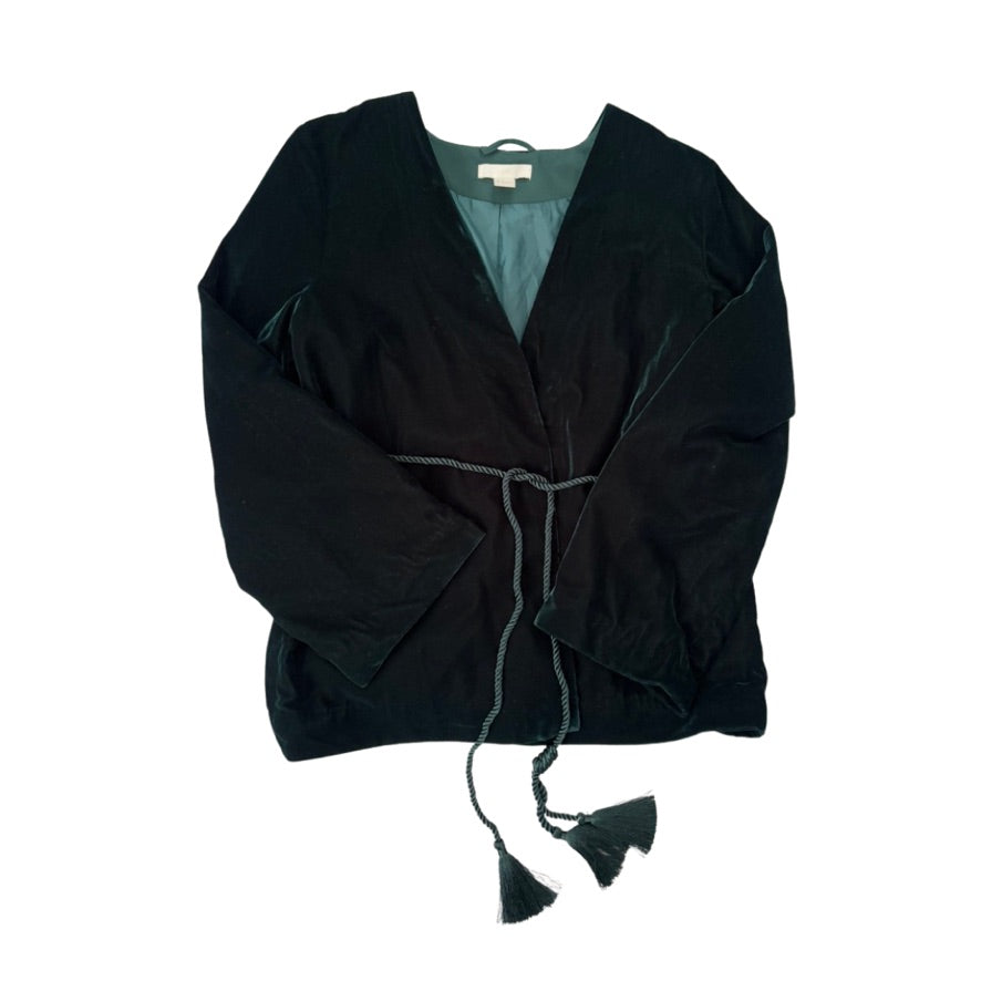 Green robe with tassels on a white background