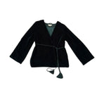 Green velvet jacket on a white background