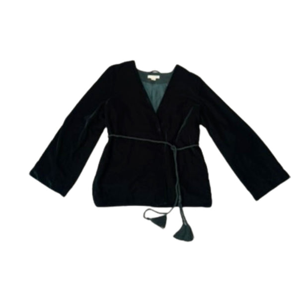 Green velvet jacket on a white background