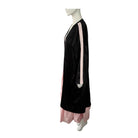 Black kimono with pink accents on a mannequin against a white background