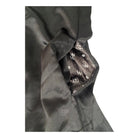 Close-up of concealed pocket patterned lining on a white background