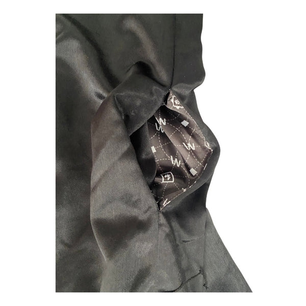 Close-up of concealed pocket patterned lining on a white background