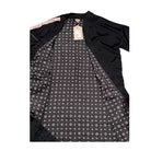 Black kimono with a patterned lining on a white background