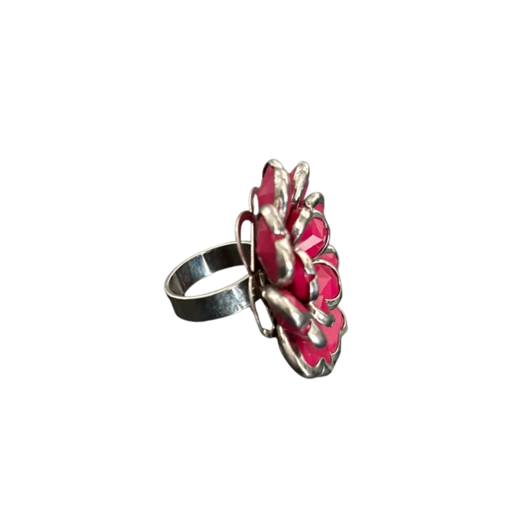 Ring with pink and silver design on a white background