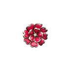 Pink floral cocktail ring with a central gemstone on a white background