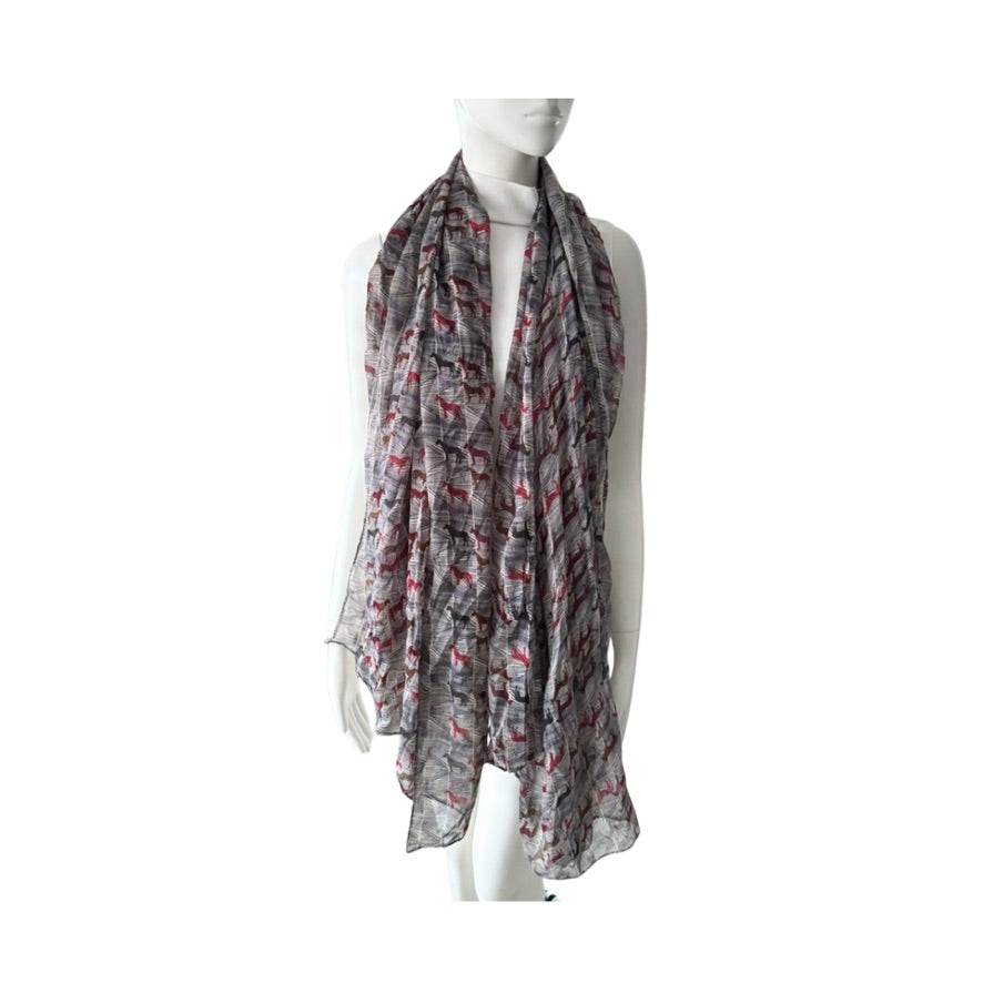 Mannequin wearing a patterned scarf on a white background