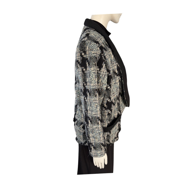 Mannequin wearing a patterned jacket on a white background