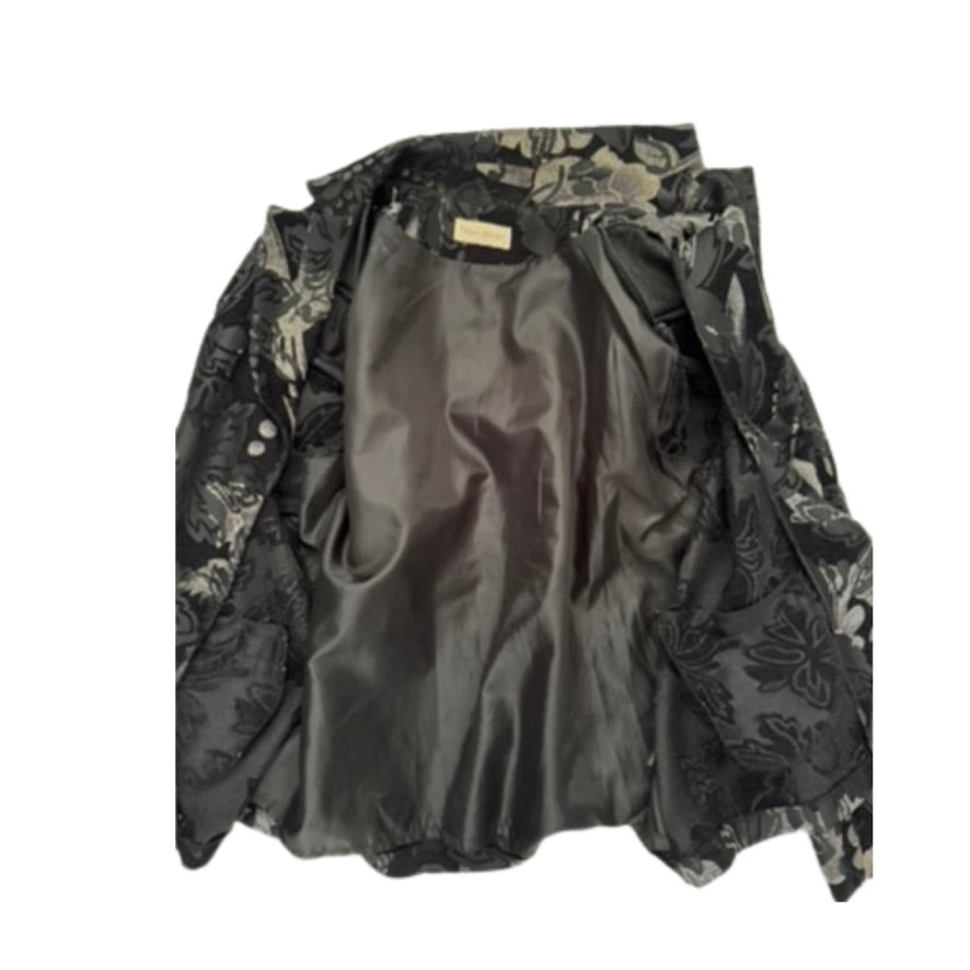 Black floral-patterned jacket on a white background