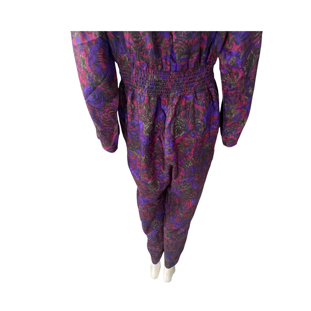 Colorful patterned jumpsuit on a white background
