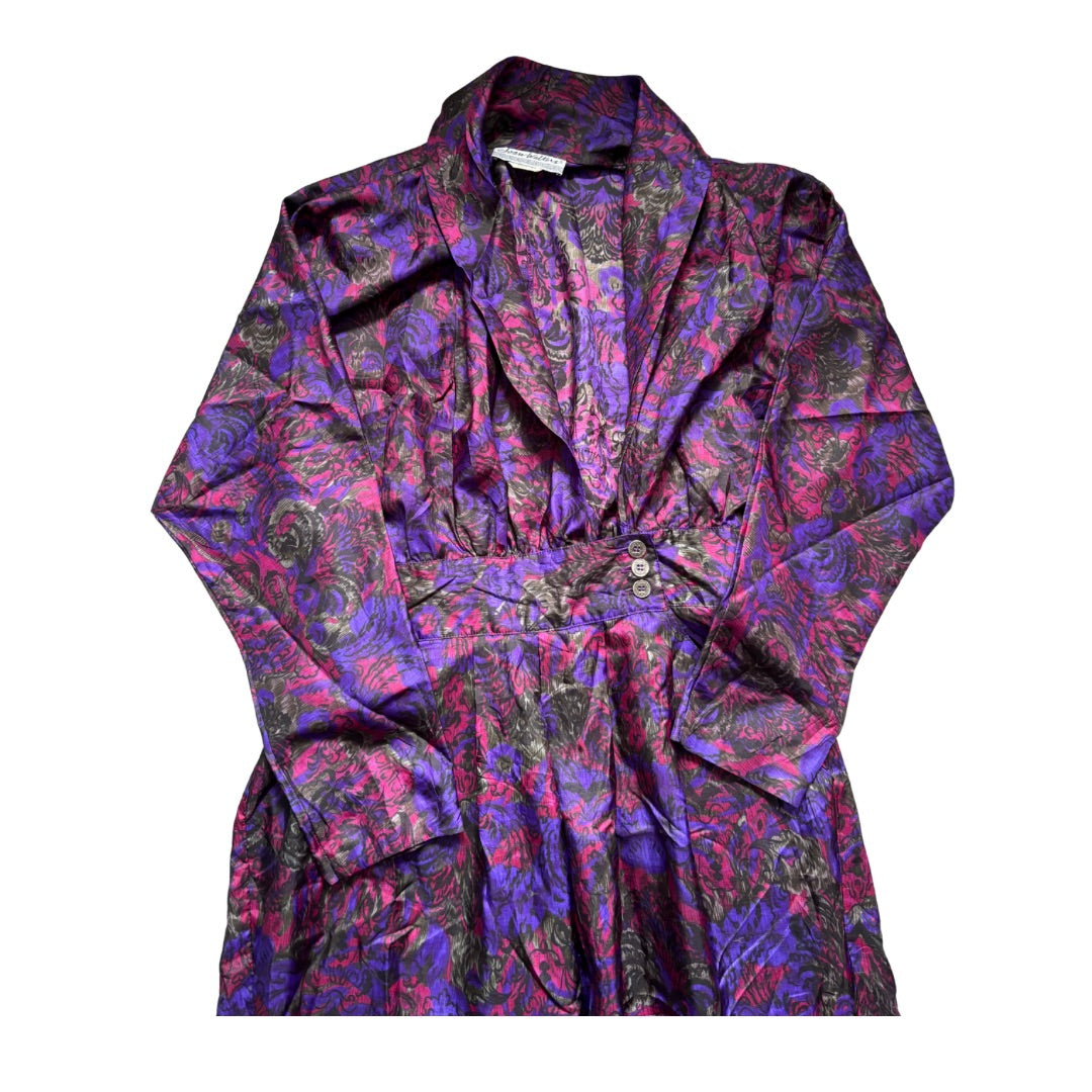 Multicolored patterned blazer on a white background