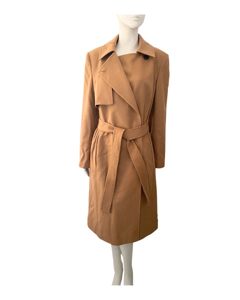 Tan trench coat on a mannequin against a white background
