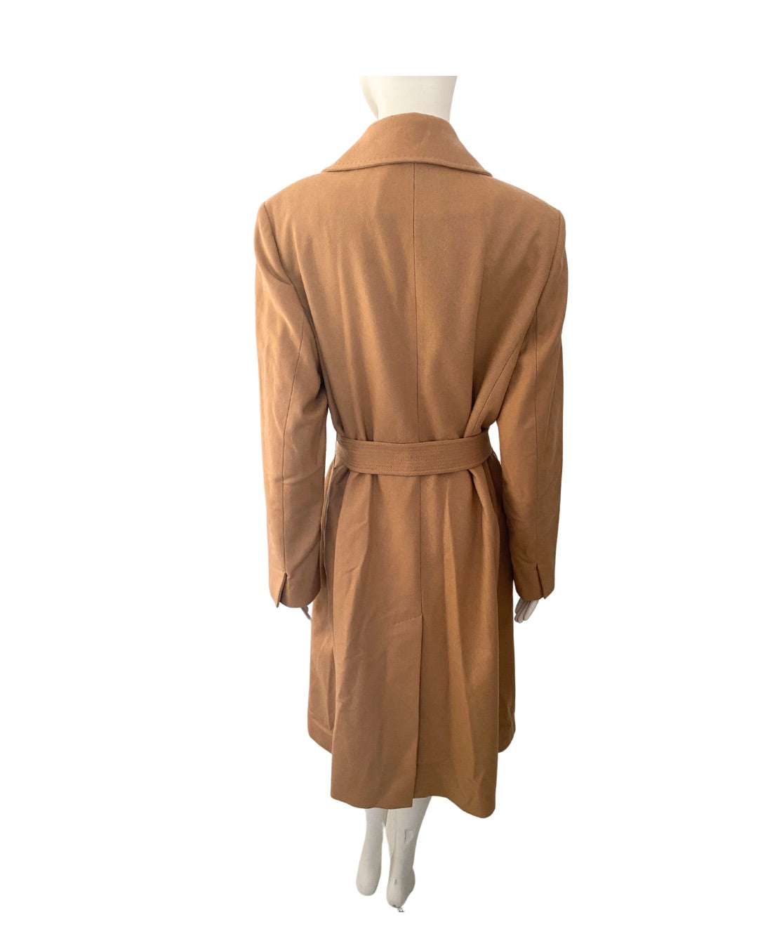 Tan coat on a mannequin against a white background