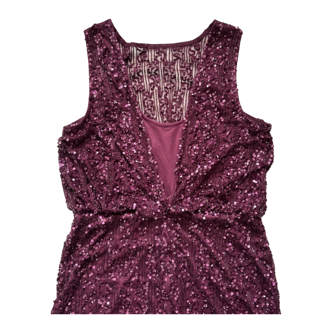 Purple sequin dress on a white background