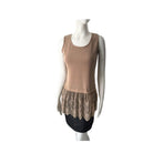 Mannequin wearing a beige sleeveless top with lace trim on a white background