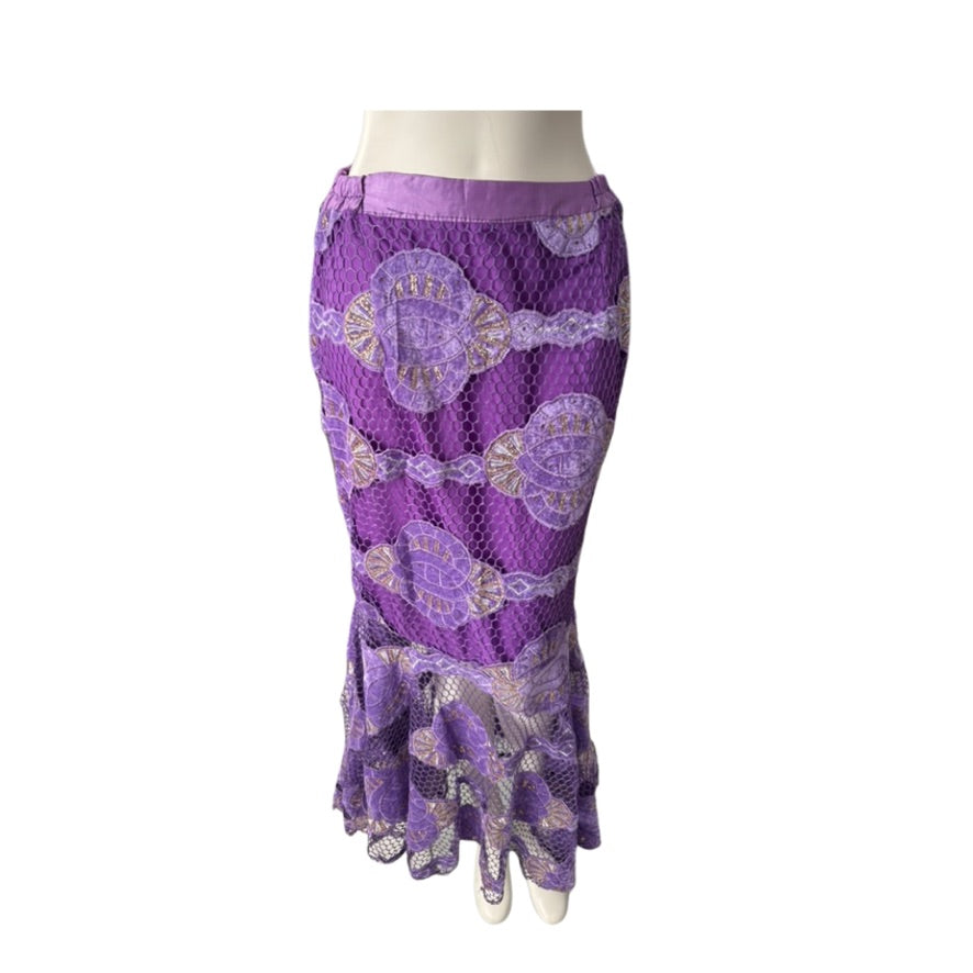 Purple patterned skirt on a mannequin against a white background