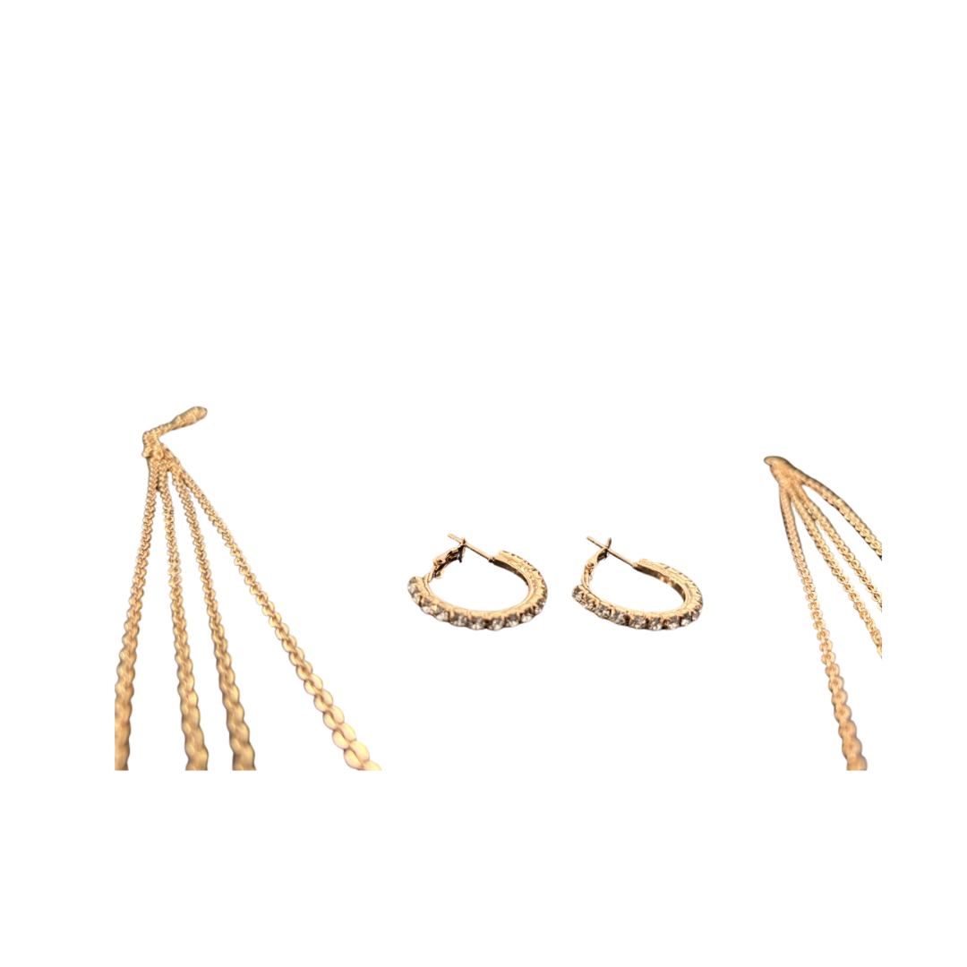 Gold earrings including hoop and fringe designs on a white background