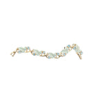 Bracelet with leaf-shaped charms on a white background