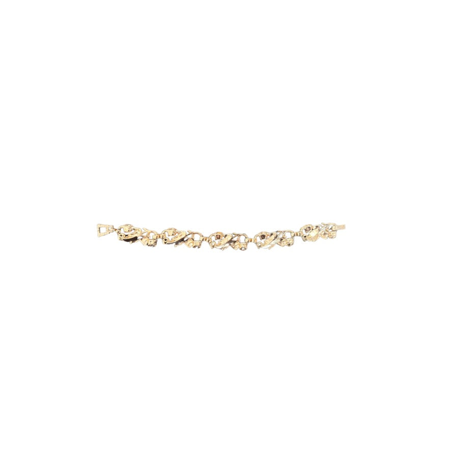 Gold bracelet on a white background