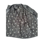 Printed coat lining with white patterns on a white background