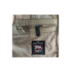 Close-up of a beige jacket with a visible brand tag on a white background