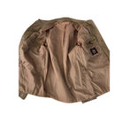 Brown jacket with a patch on a white background