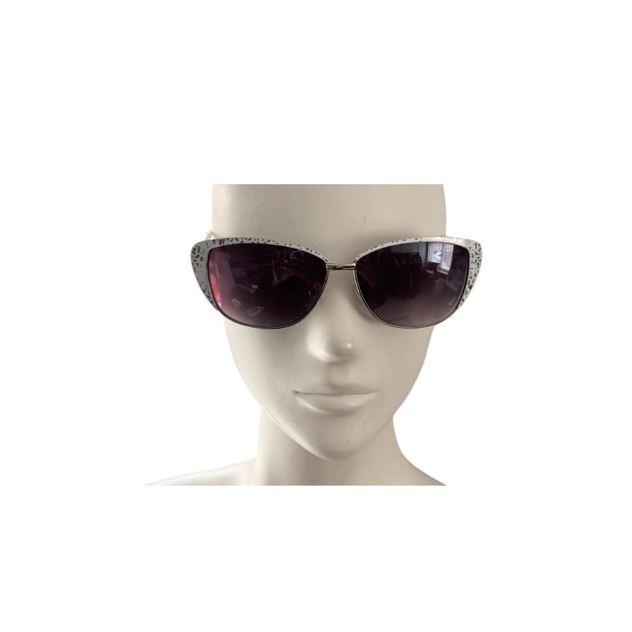 Sunglasses on a mannequin head with a white background