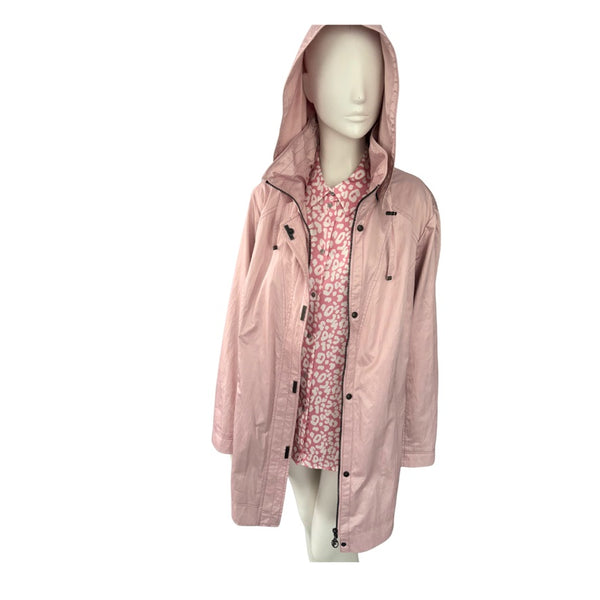 Pink raincoat on a mannequin against a white background