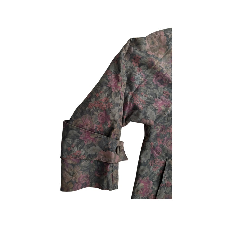 Floral patterned coat sleeve on a white background