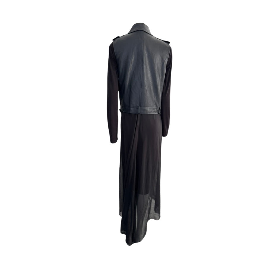 Black dress with long sleeves and a high collar on a white background