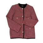Red and black checkered coat with gold buttons on a white background