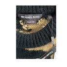 Close-up of a Michael Kors sweater with brand label and 'Italian Yarn' text.