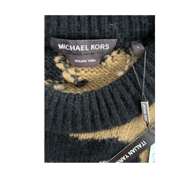 Close-up of a Michael Kors sweater with brand label and 'Italian Yarn' text.