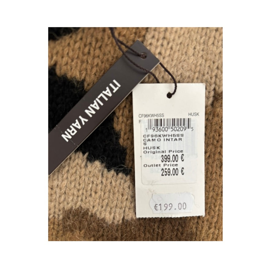 Knitted fabric with a 'Italian Yarn' tag and price label.