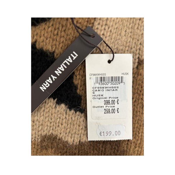 Knitted fabric with a 'Italian Yarn' tag and price label.