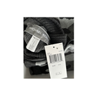 Knitted item with Michael Kors tag on a white background