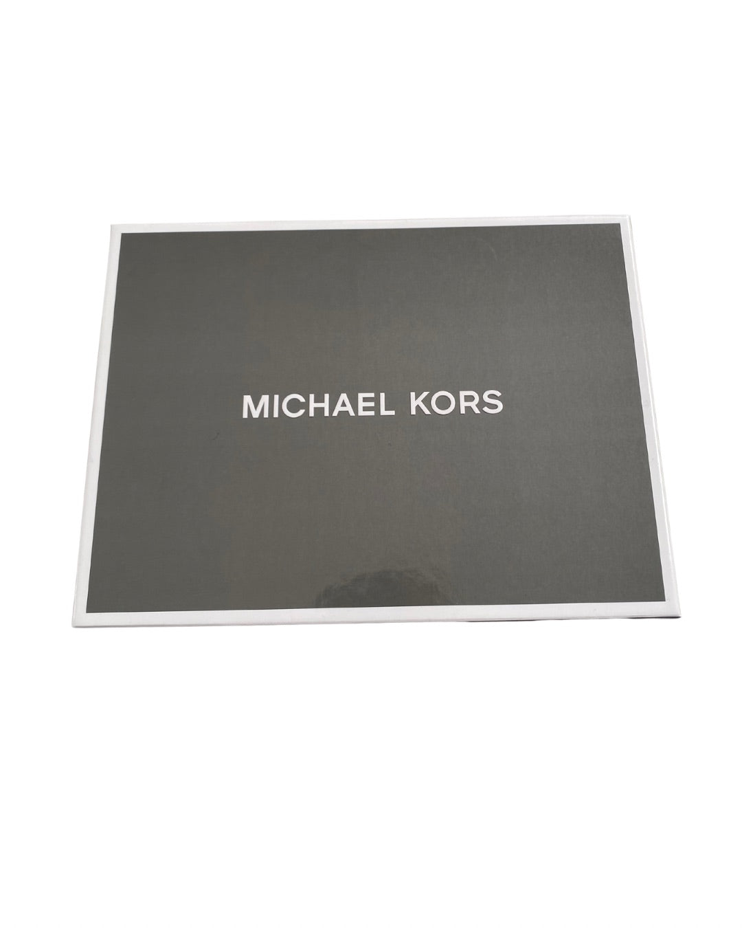 Grey box with 'Michael Kors' logo on a white background