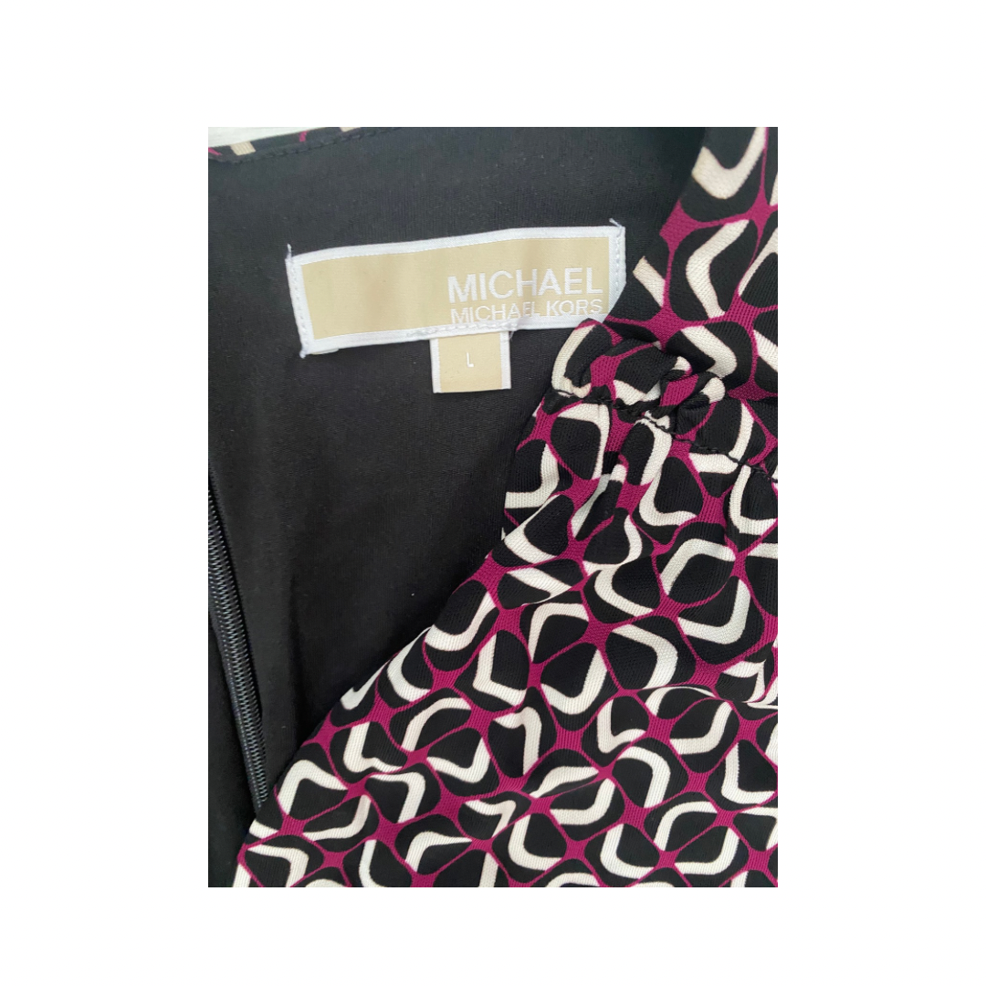 Patterned fabric with a visible brand label on a white background