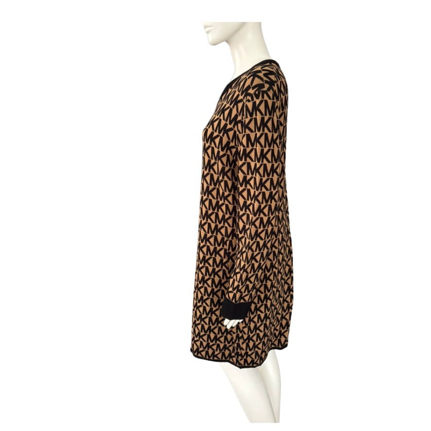 Mannequin wearing a brown dress with black geometric pattern on a white background