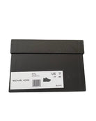 Black shoe box with a label on a white background