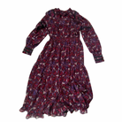 Long-sleeve dress with paisley pattern on a white background